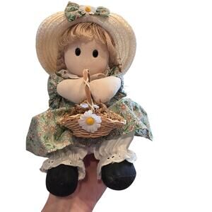Vintage Berkeley Designs musical rag doll holding a basket